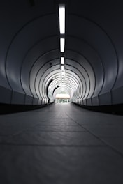 gray tunnel with white light