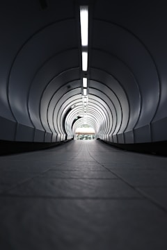 gray tunnel with white light