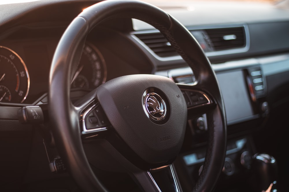 black toyota car steering wheel