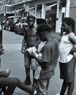 A group of teenagers discussing personal finance strategies.