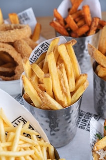 french fries on white ceramic plate