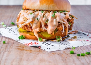 burger on white and red paper