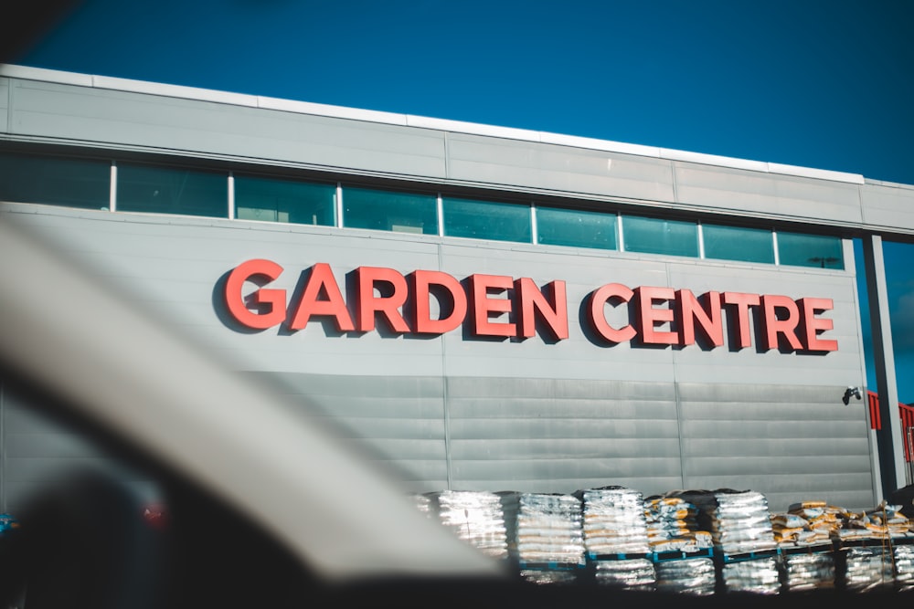 a building with a sign that says garden centre