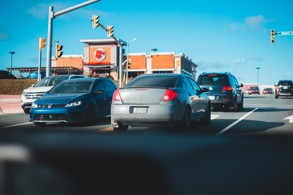 cars parked on parking lot during daytime