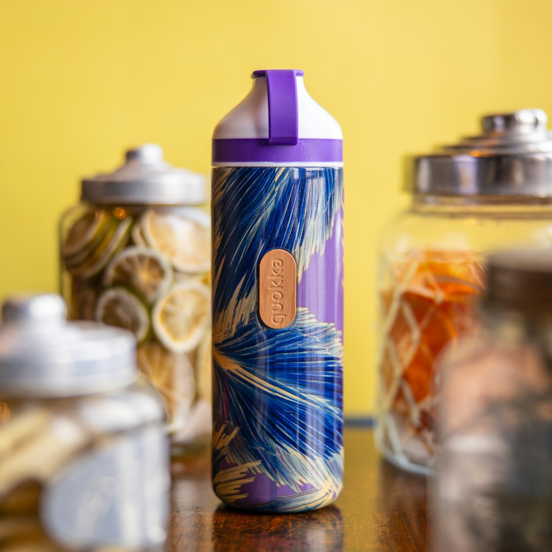 blue and silver vacuum flask