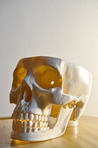 yellow and white ceramic figurine