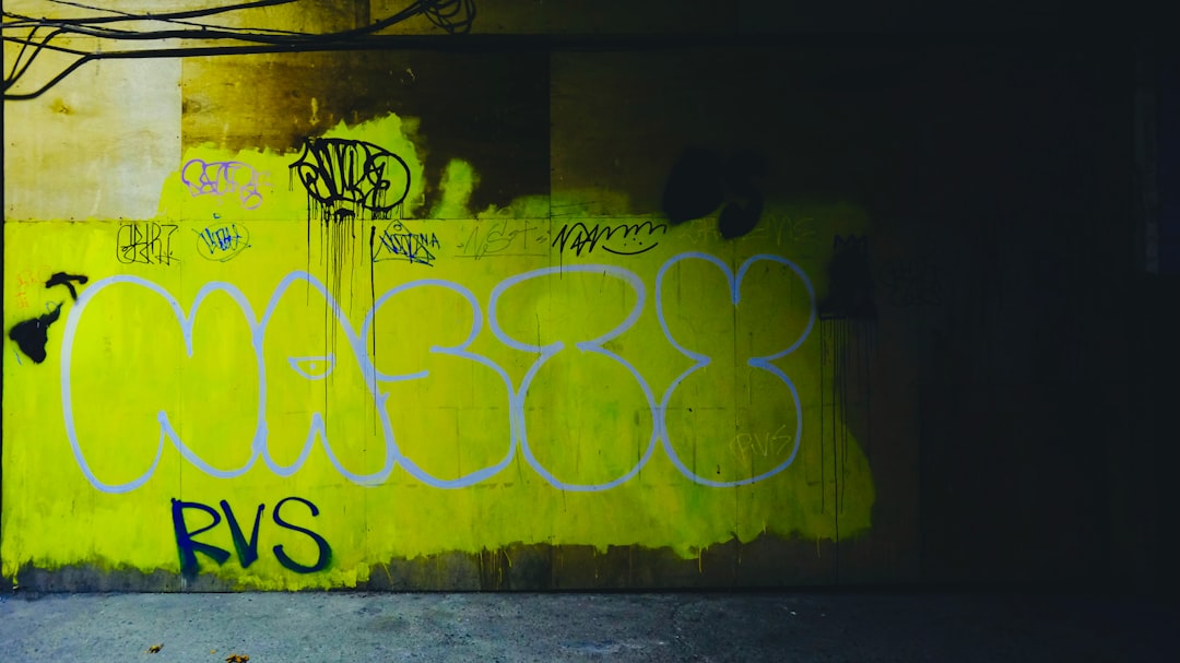 yellow and black wall graffiti