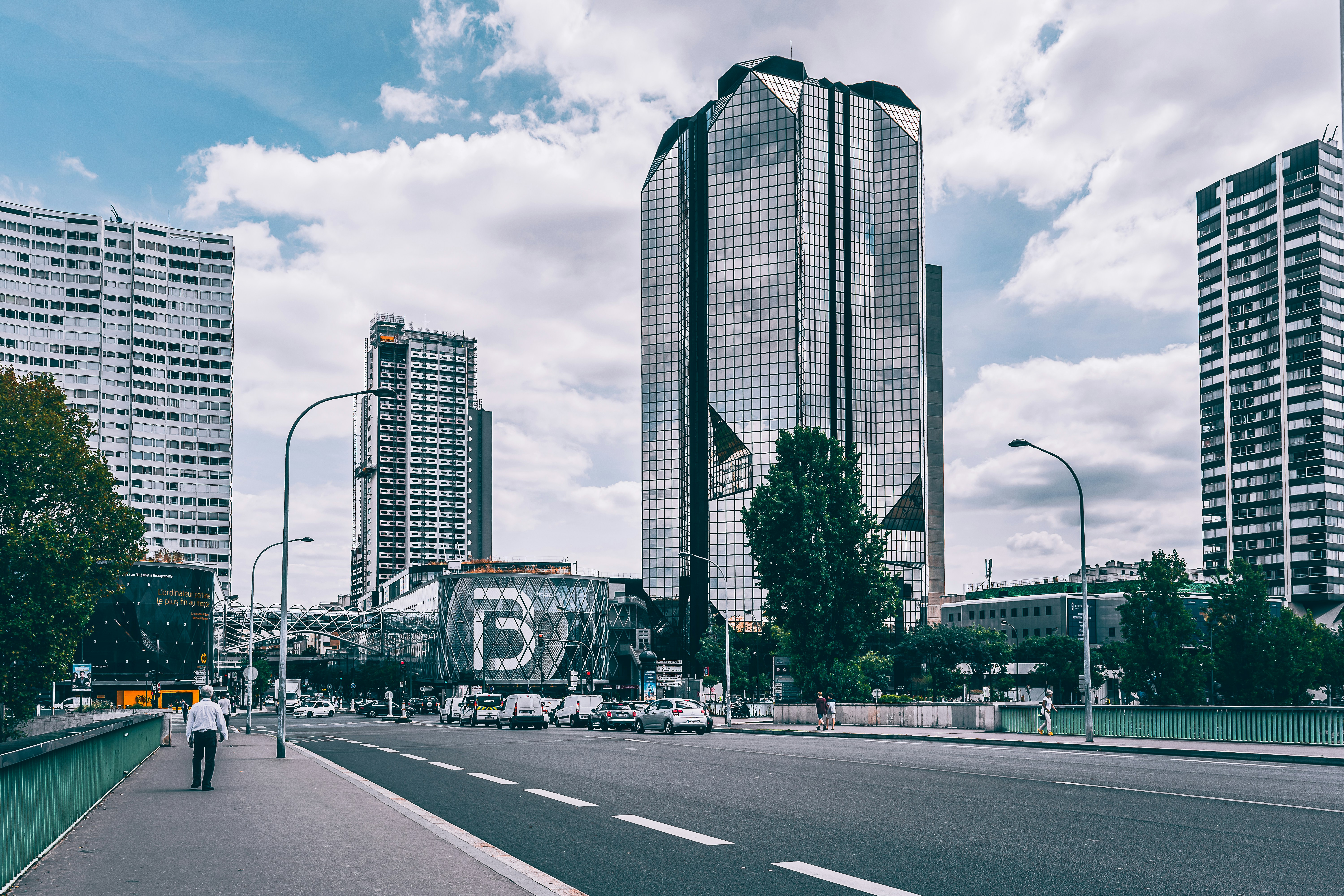 grayscale photo of city buildings