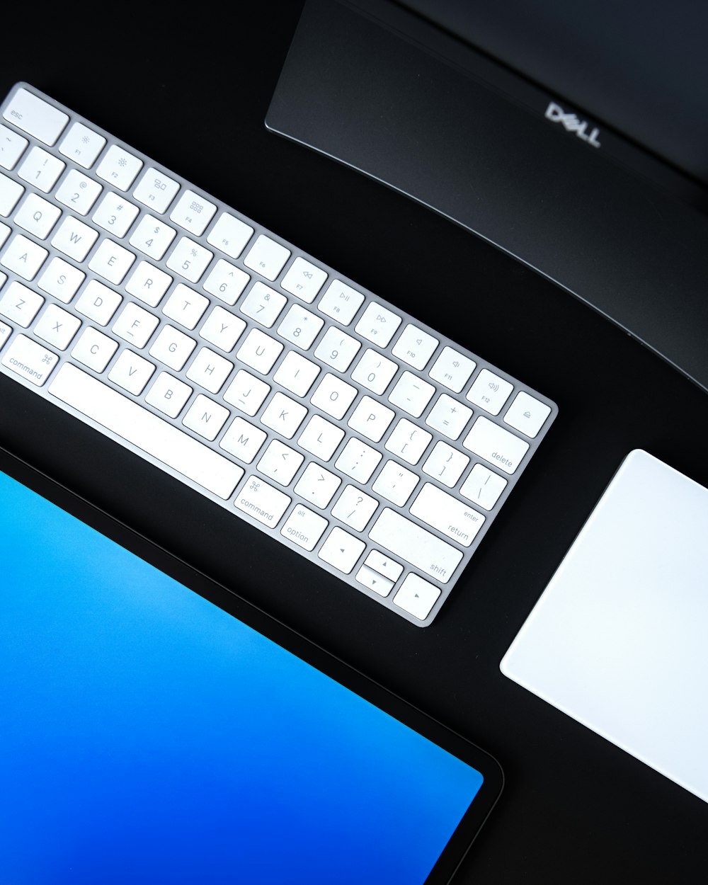 black and blue logitech keyboard