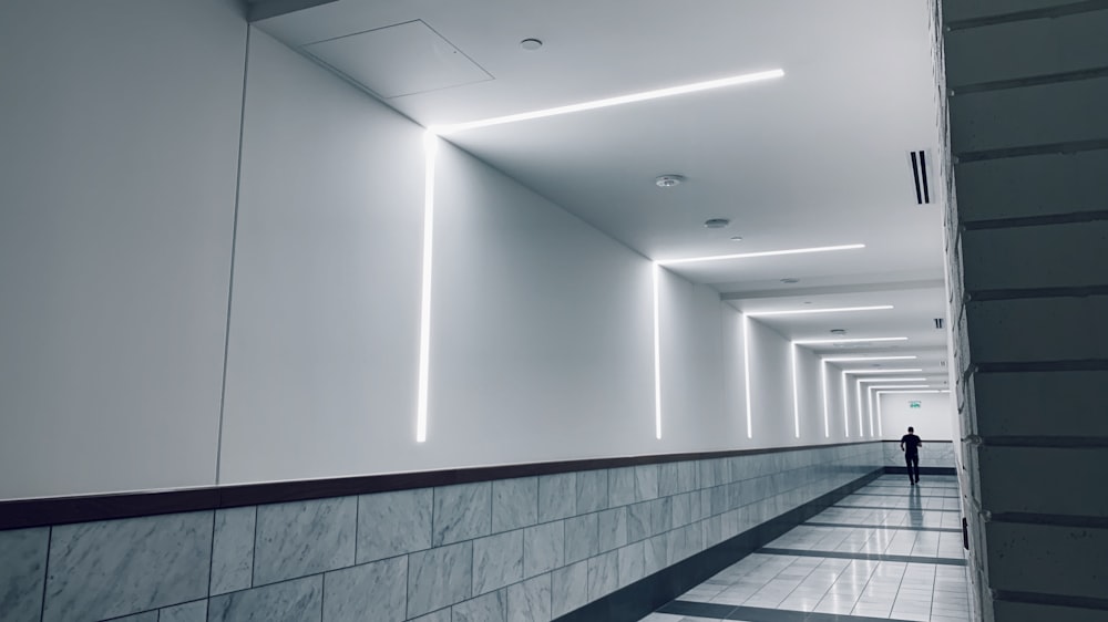 white and black tiled hallway