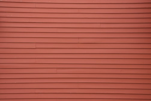 red brick wall during daytime