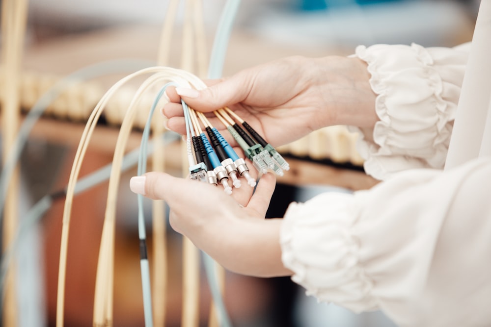 person wearing silver diamond ring