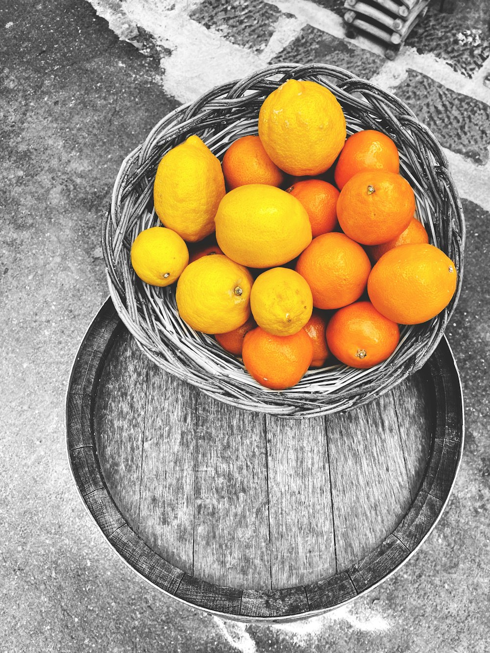 orange fruits in brown woven basket