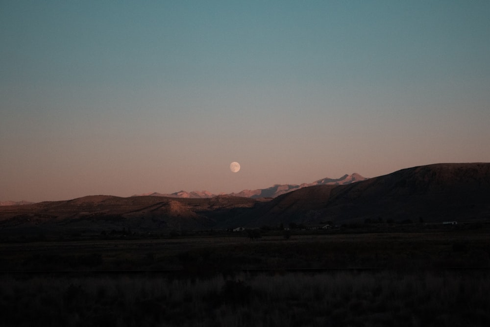 silhouette of mountains during sunset