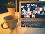 macbook air displaying woman in white shirt