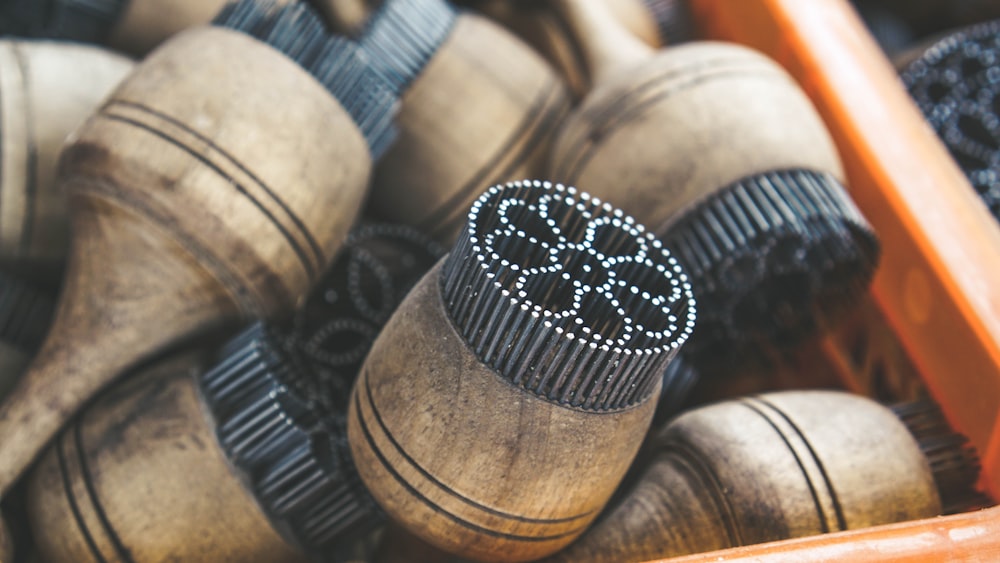 black and brown wooden spool