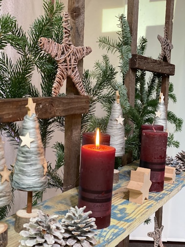 Handcrafted Christmas garlands made from natural, sustainable materials glowing softly on a mantel.