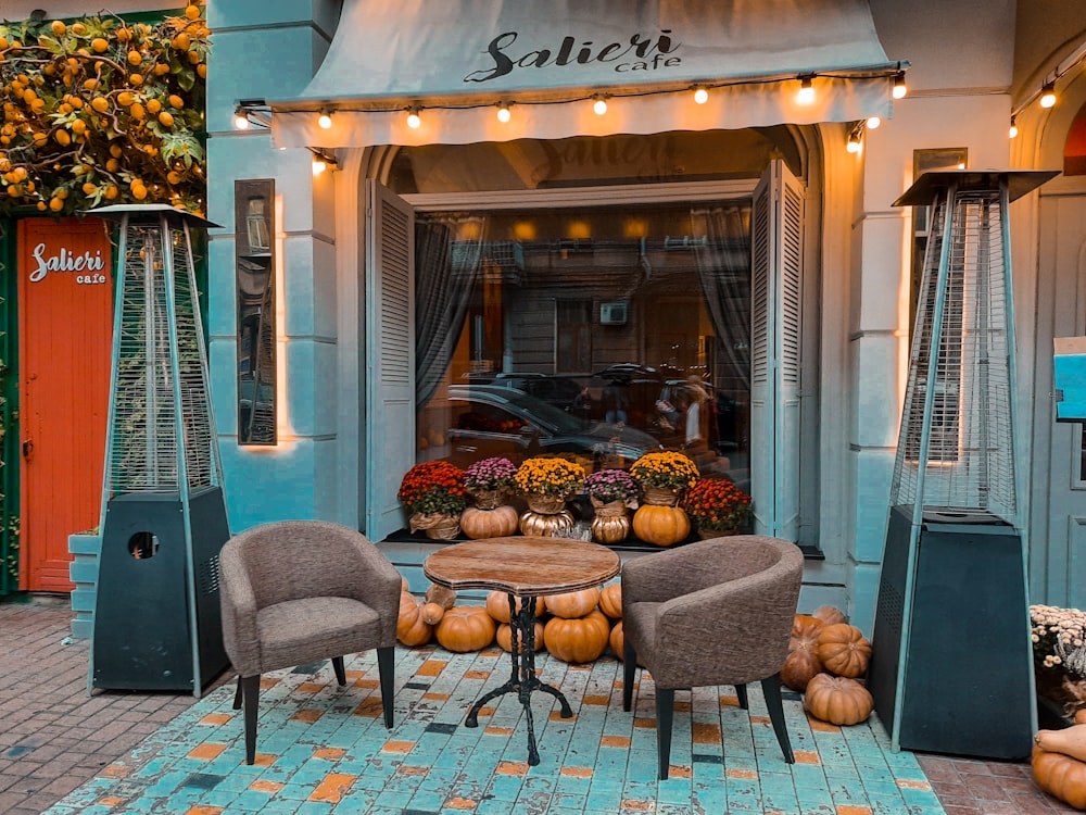 brown and black padded armchairs