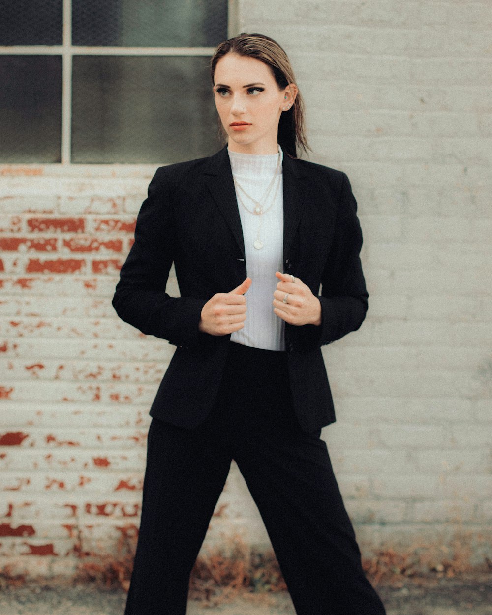 woman in black blazer and white dress shirt