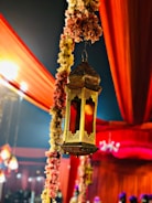 Decorative lanterns and stage setup reflecting Arabian and Pakistani motifs.
