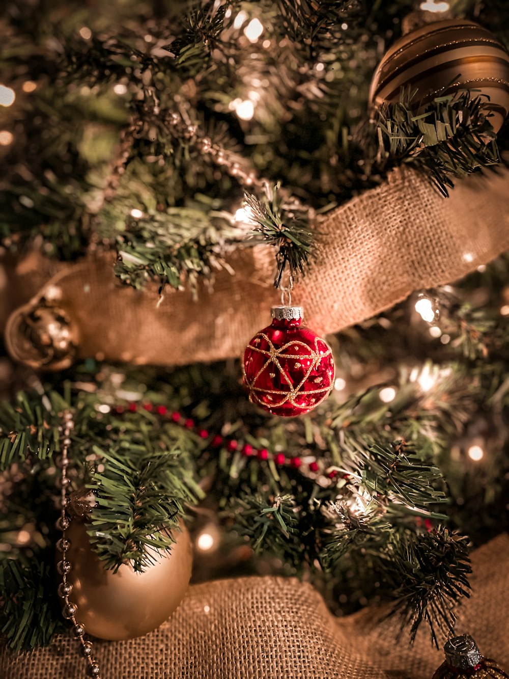 green christmas tree with red baubles