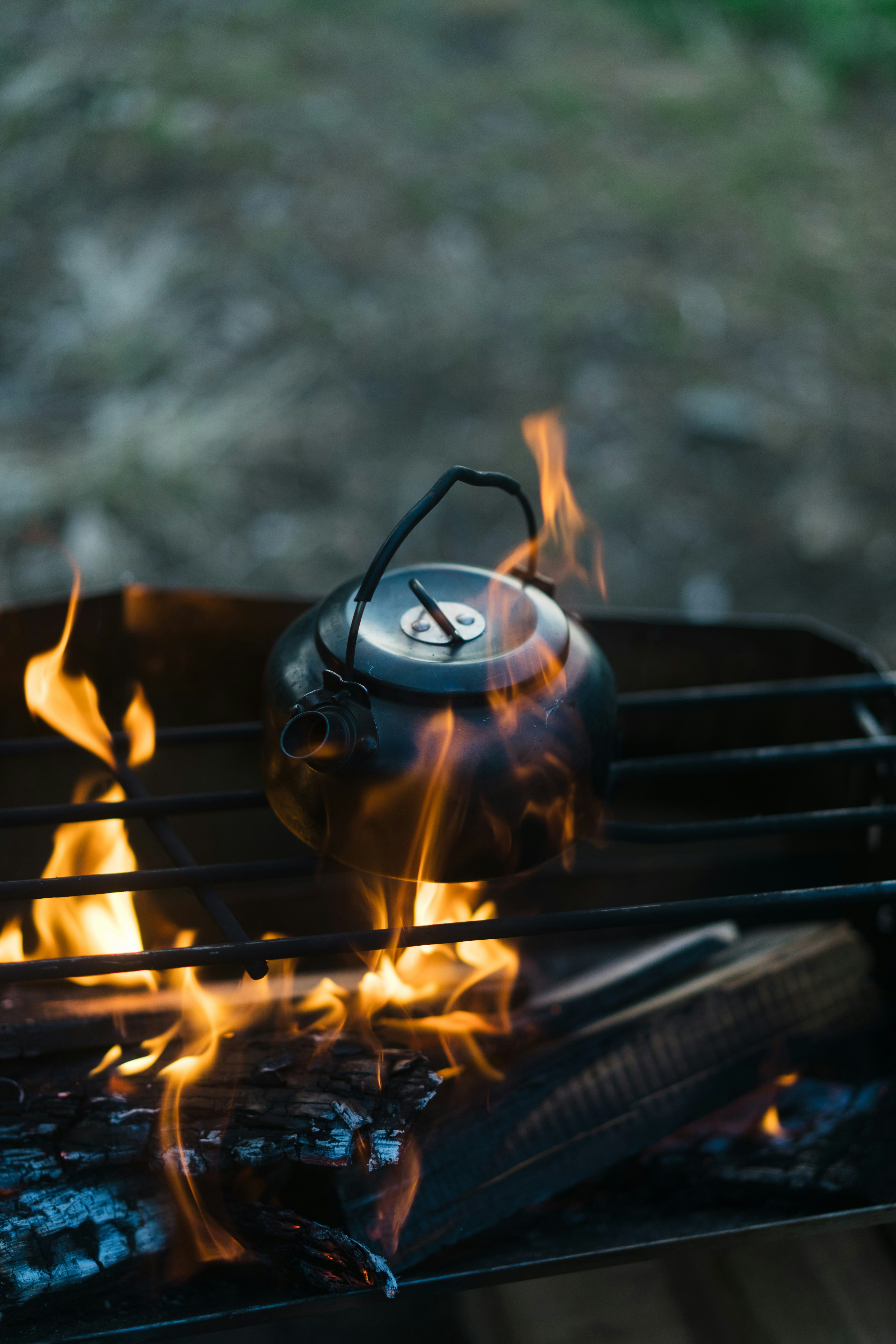black-and-silver-portable-stove-on-fire