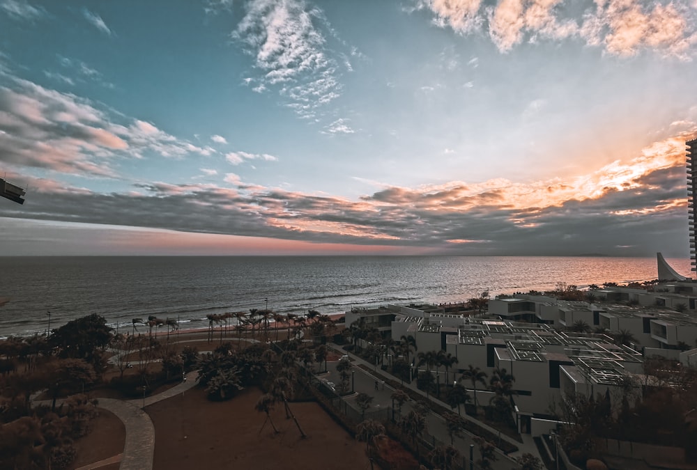 a view of the ocean from a high building