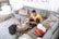 A happy family enjoying time together in a bright living room.