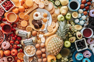 assorted fruits on brown wooden bowls
