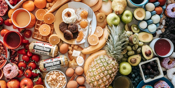 assorted fruits on brown wooden bowls