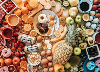 assorted fruits on brown wooden bowls