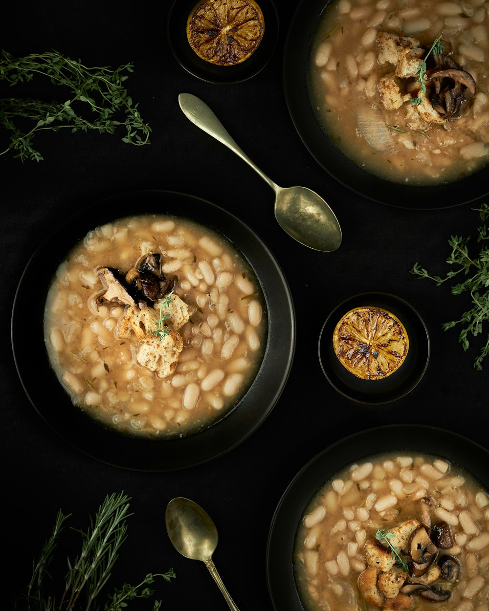 soup in black ceramic bowl