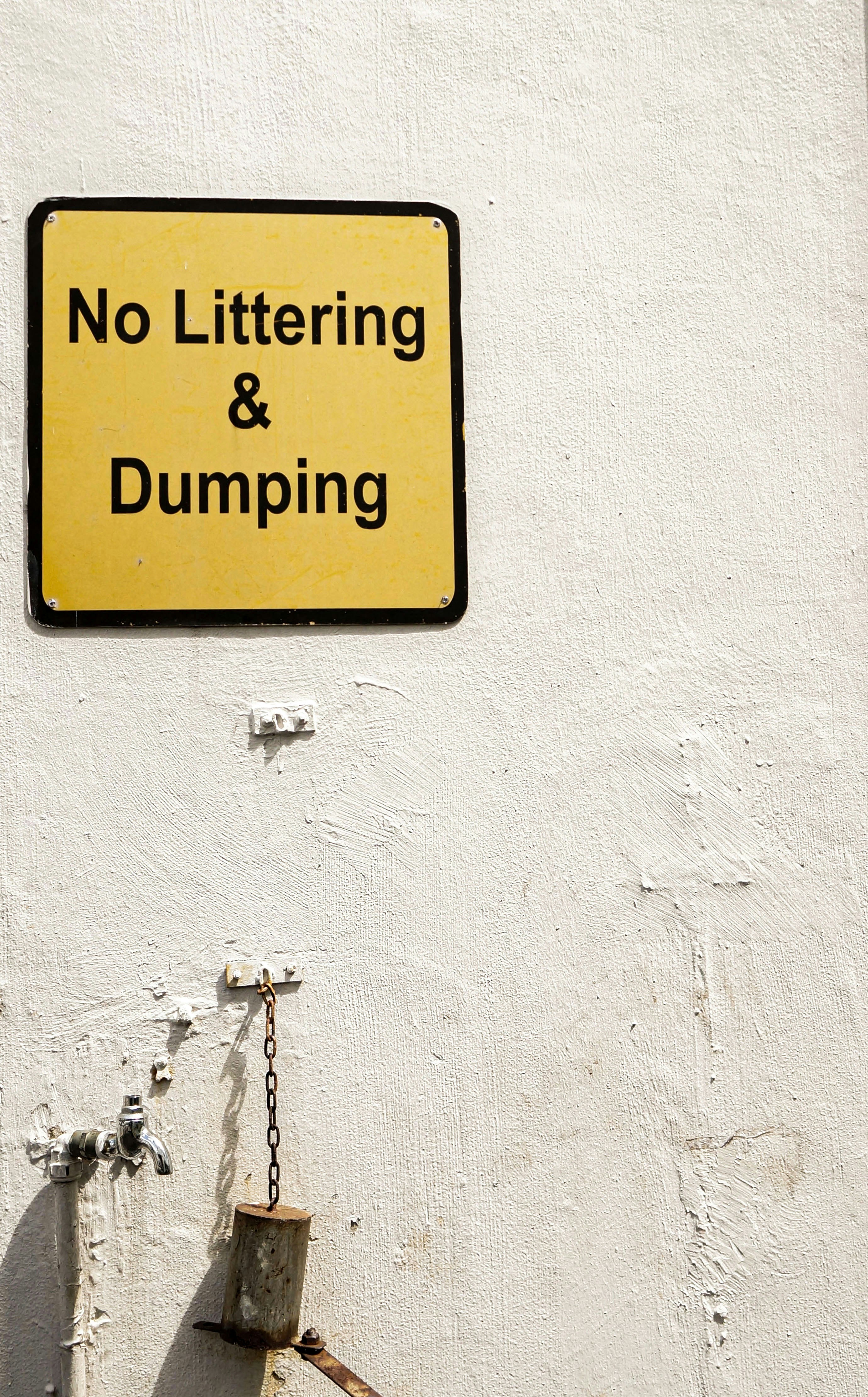 yellow and black no smoking sign