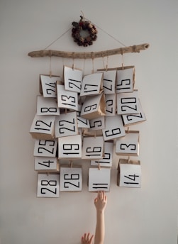 A cozy Christmas calendar with small festive gifts behind each door.