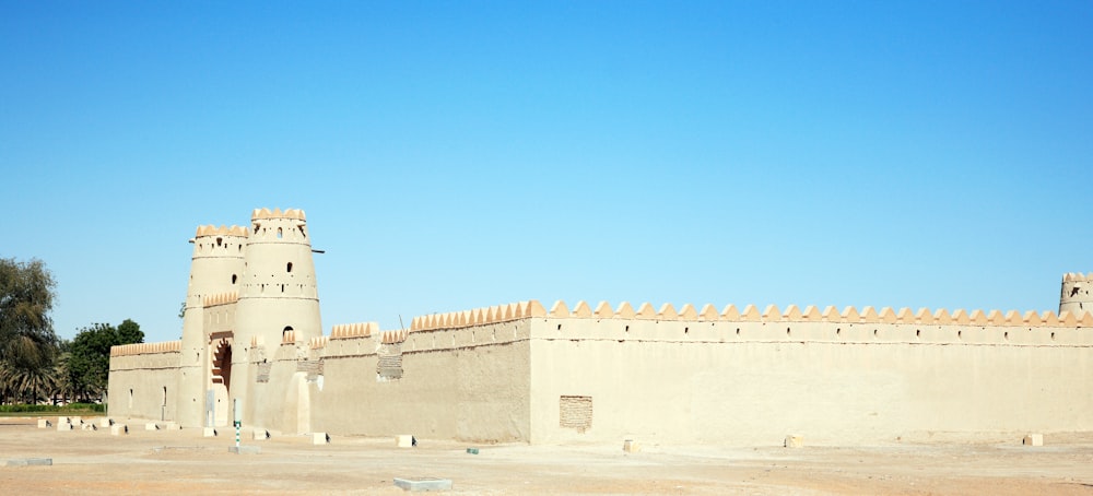 brown concrete building under blue sky during daytime