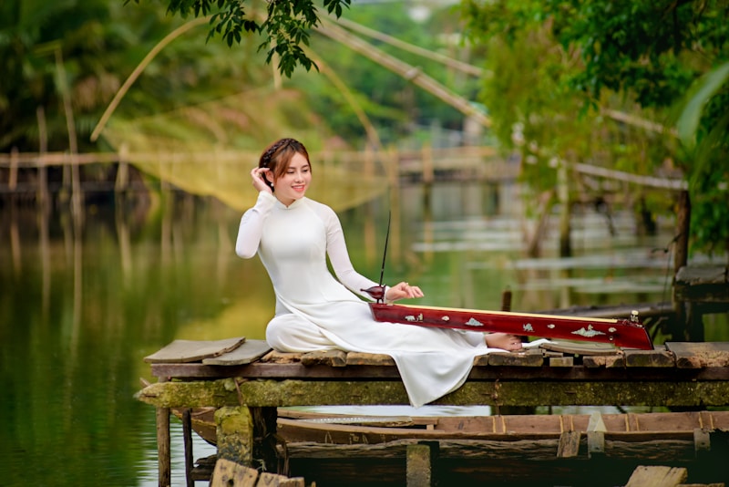 Sophisticated woman in white on dock