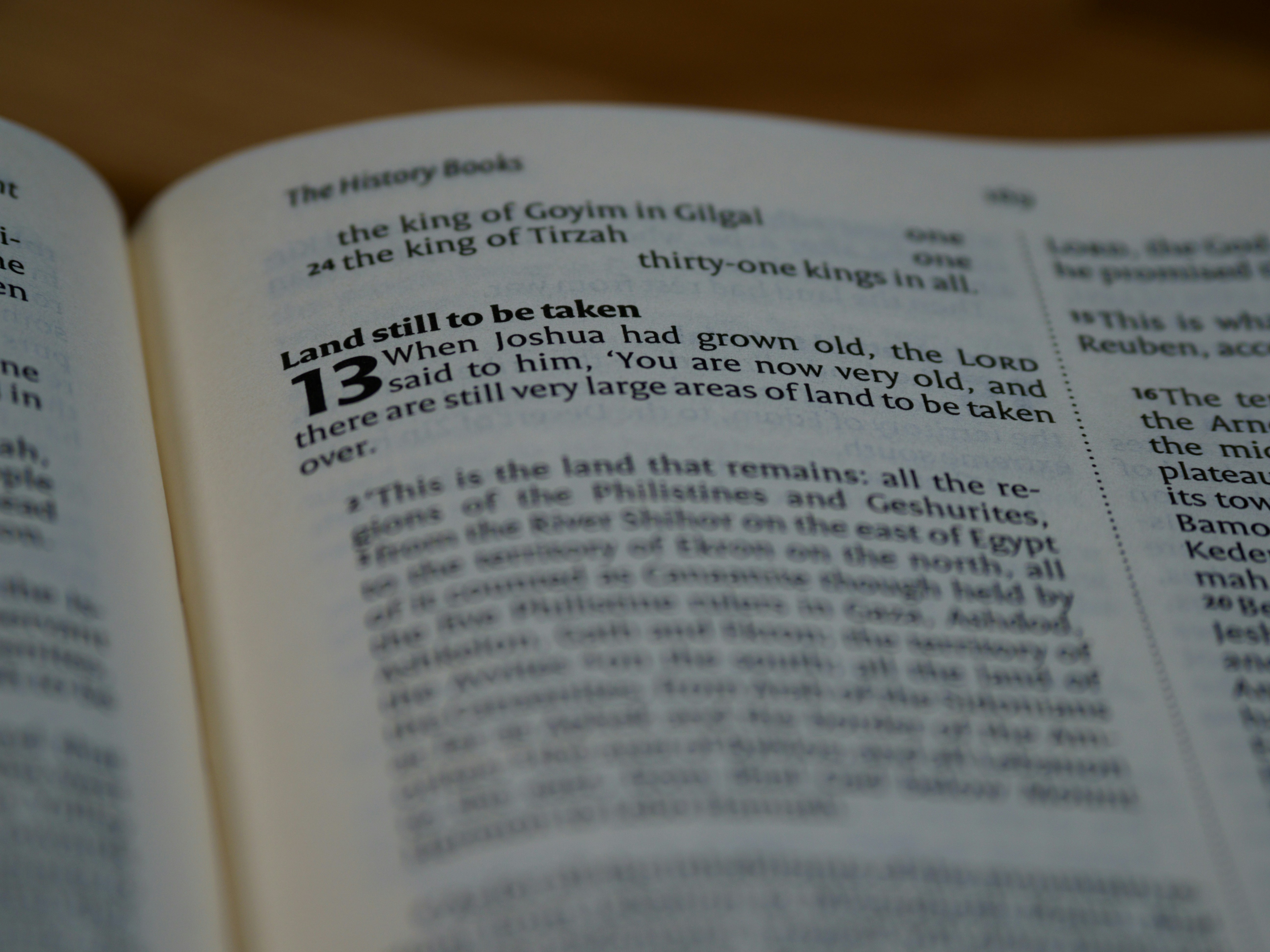 white book page on brown wooden table