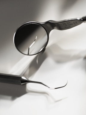 Dental moirror on white textile
