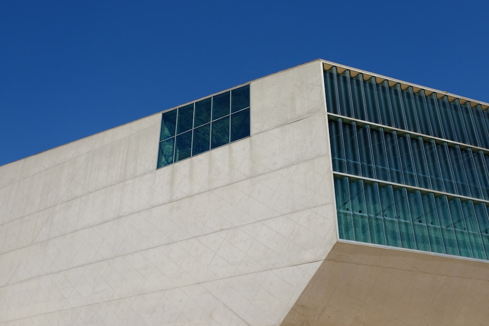 white concrete building under blue sky during daytime