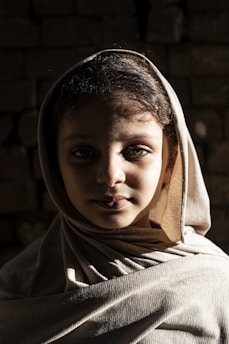 woman in white hijab in grayscale photography
