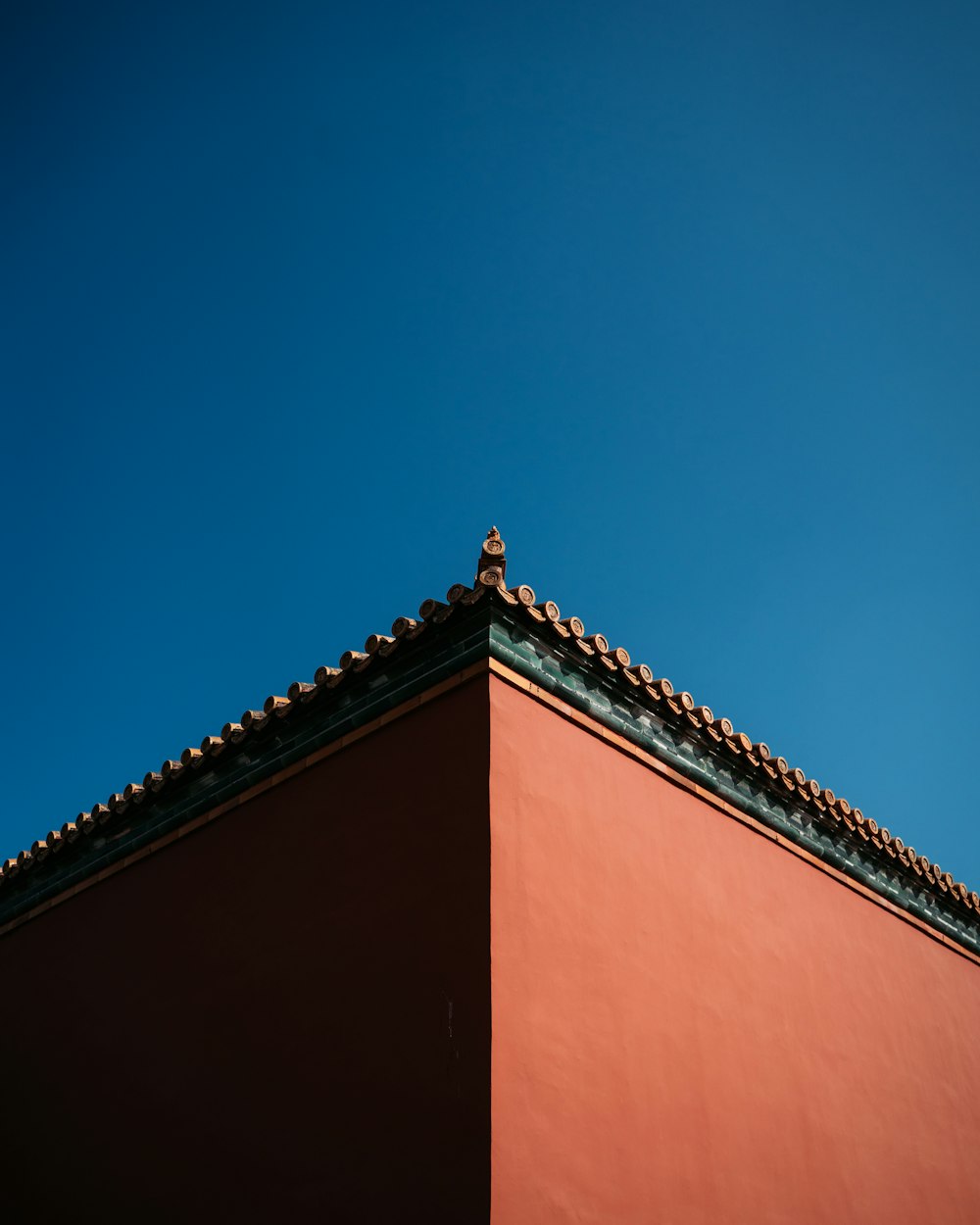 brown concrete building under blue sky during daytime