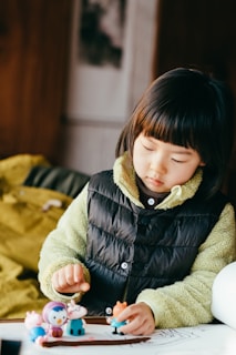girl in black bubble jacket smiling