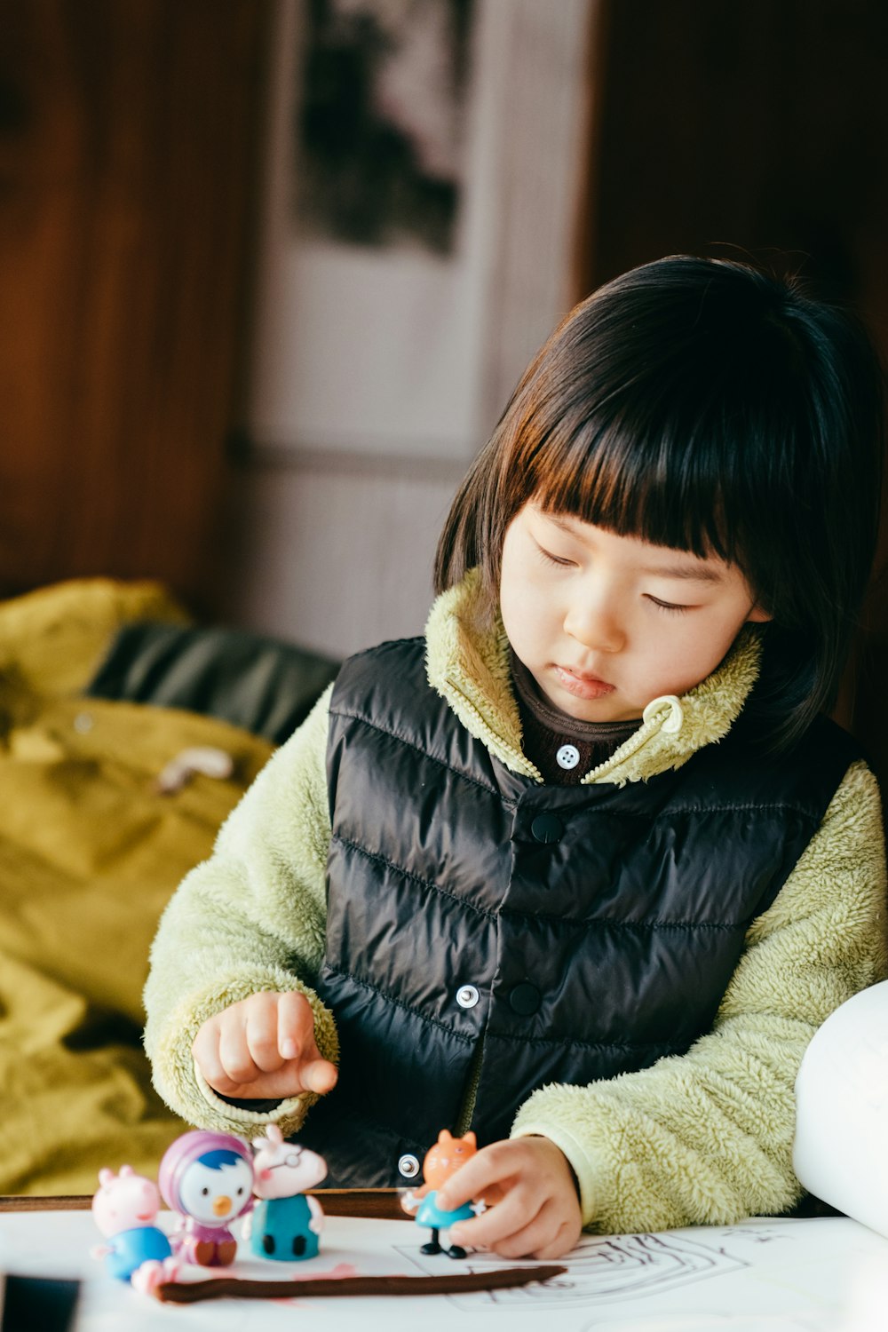 girl in black bubble jacket smiling