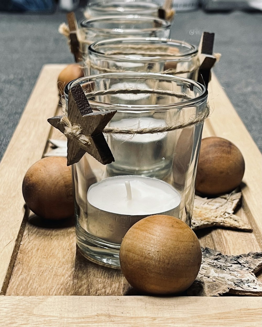 clear drinking glass with milk on brown wooden table