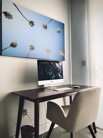 A serene coastal-inspired workspace with minimalist decor and natural light.