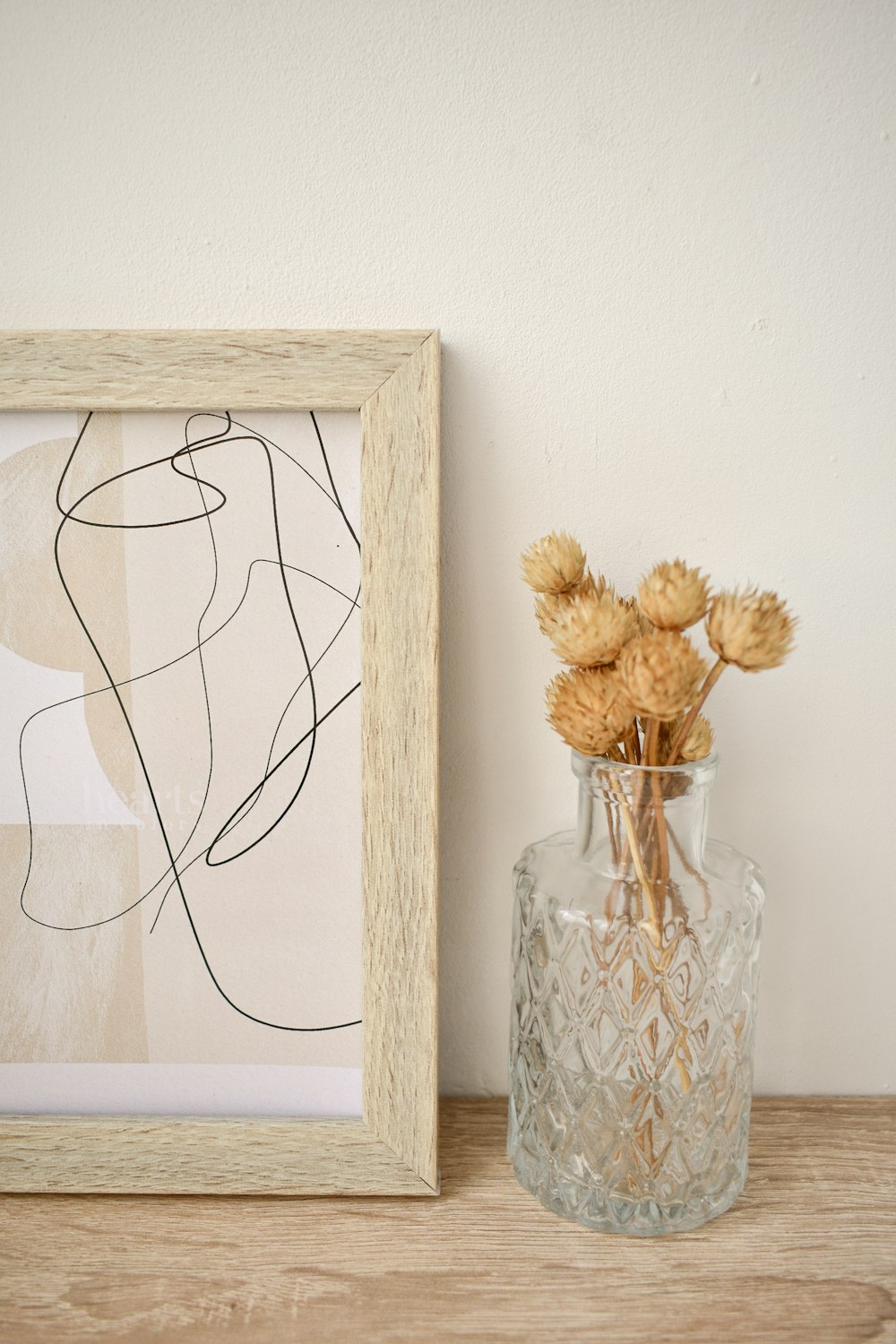 white flowers in clear glass vase