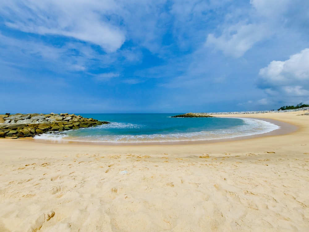 blue sea under blue sky during daytime