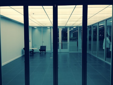 A sleek, minimalist office space with sharp lines and engineering-blue accents.