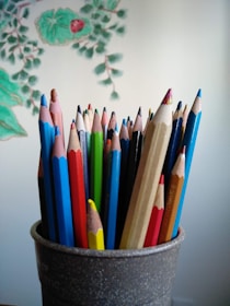 coloring pencils in gray container
