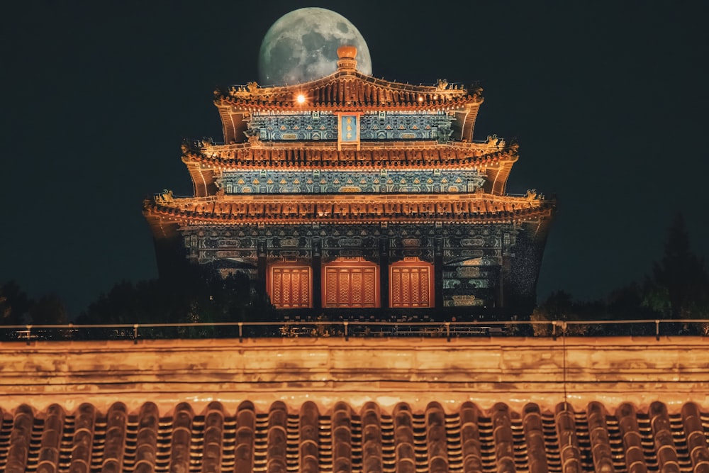 brown and white concrete building during nighttime